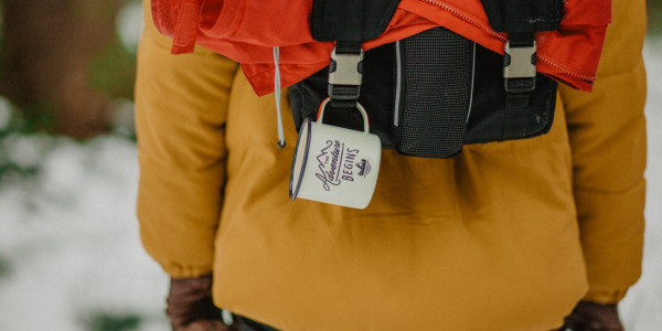 Photo | Explorers backpack with the adventure begins cup